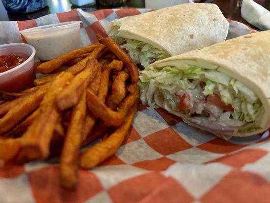 Chicken Caesar Wrap with the upgraded sweet potato fries ! Yummm!