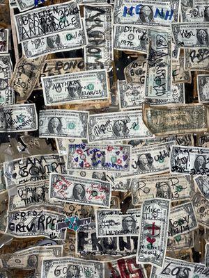 Cool signed $1 bills of past patrons over the years