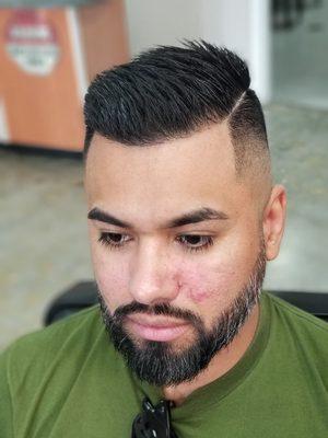 Razor comb over fade.