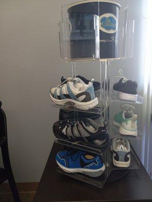 Some of the diabetic shoes that you can order on display in the waiting room.