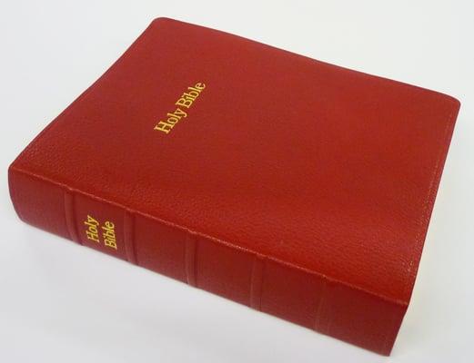 A rebound Bible in our Deluxe Package featuring scarlet red goatskin leather.