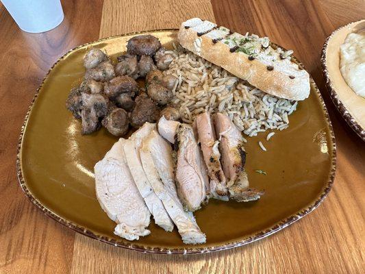 Grilled chicken w Roasted Mushrooms W. Garlic Parmesan Butter, Basmati Rice Pilaf & Slice Grilled Rustic Bread