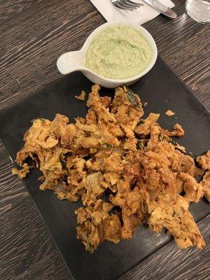 Onion Pakora $9 not too oily. Good coconut dip. Would get again