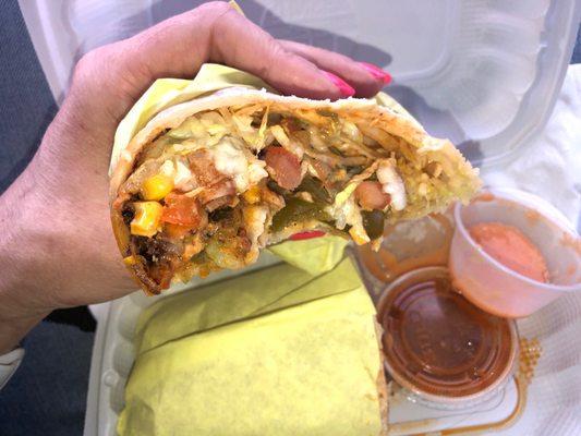 Chicken Wrap. Comes with a side of refied beans & chops. It's SO delicious!!!!