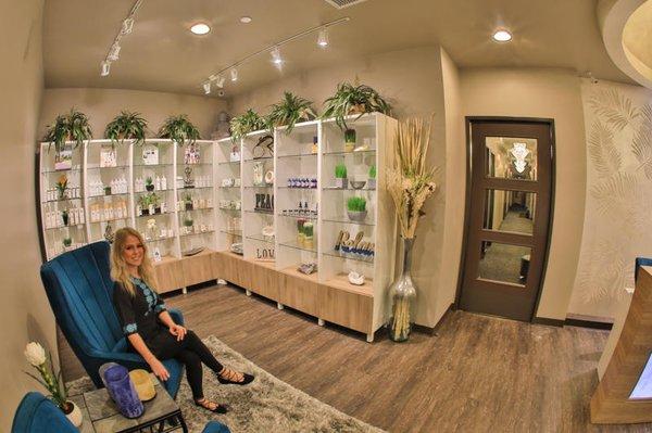 Our front lobby at Inspire Day Spa in Mercado del Lago, Scottsdale offers a beautiful seating area and an extensive display o...