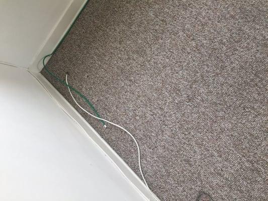 Wires coming out of the floor at one of the places they manage