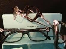 A large selection of designer frames including Tiffany, Michael Kors, Oakley, Coach, Maui Jim, Rayban.