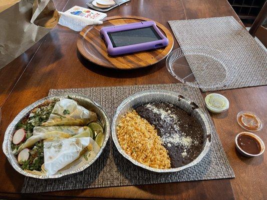 Al pastor tacos and rice and bean plate