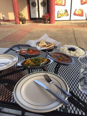 Lamb Curry, Chicken Tikka Masala, Mixed Vegetable Curry, rice, and Naan.