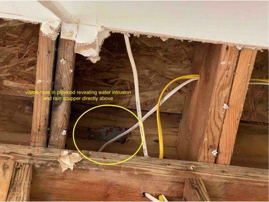 Twin Homes didn't even try to seal this gaping hole in the subfloor.