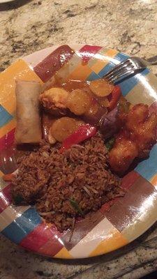 China Fare takeout from top left going clockwise: spring roll, crab macau, spicy chicken pad ped, orange chicken, and veggie fried rice. YUM