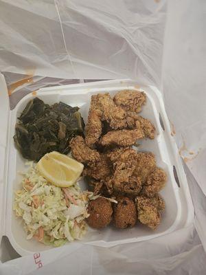 Fried oysters and catfish with greens and cold slaw.