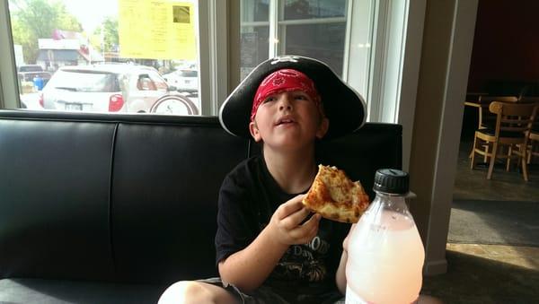 Enjoying  Pizza during Pirate week.