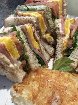 Breakfast Club Sandwich with egg and ham (bacon is optional).