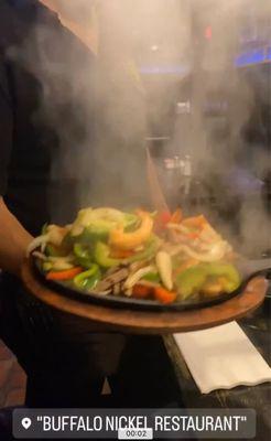 Fajitas for two comes out sizzling