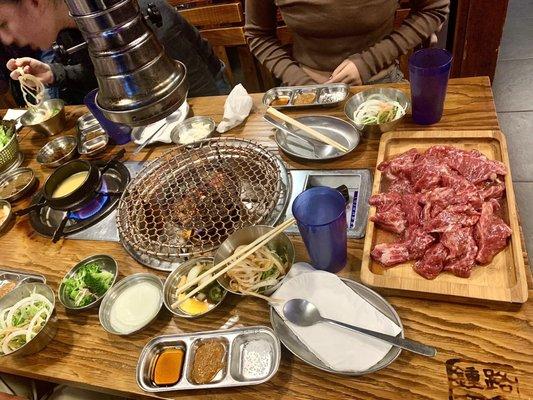 Prime Marinated Kalbi for $38.99 per portion.  5* Pictured is 4 portions ($155 worth) on the tray.  Steamed egg is heating up on the left.