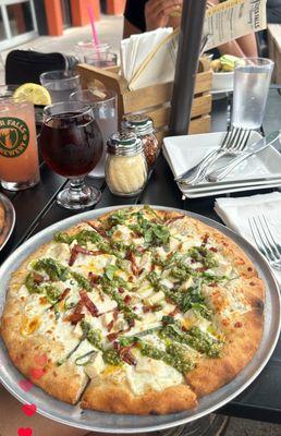 Chicken pesto pizza with pomegranate seltzer