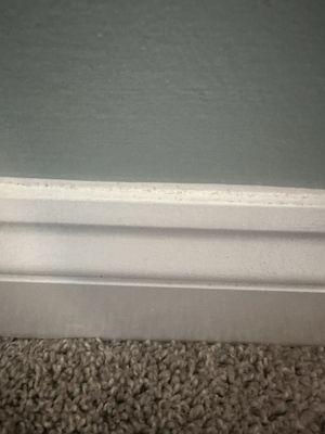 Baseboard not deep cleaned and employee said it was residue from wall paint that a professional painter did. Nonsense!