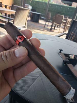 Thorough enjoying this TATUAJE cigar on their relaxing outdoor lounge area.