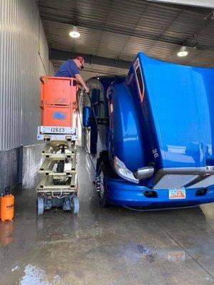 Washing the truck and the trailer behind it