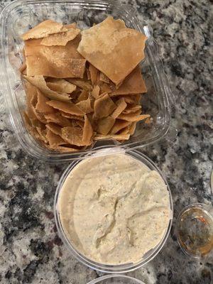 Pita chips and cilantro jalapeño hummus