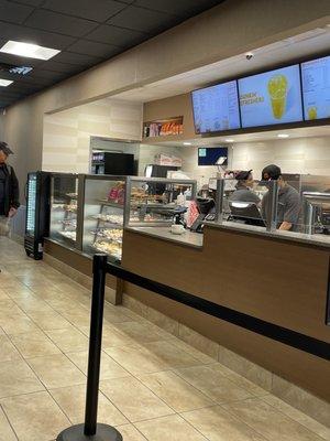 Cashier and donut display