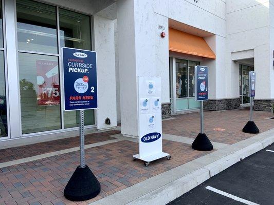 Outside: Four (4) Curbside pickup parking spots rights outside the store