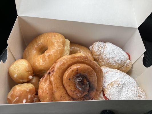 Cinnamon Roll, Glazed Donuts and Strawberries & Cream donuts