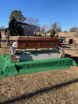 My brother's casket with the concrete liner.