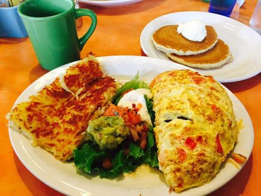 El Paso omelette with a side or pancakes. Yummy. All the food here looks delicious and plentiful. Side note: Bobtail parking!