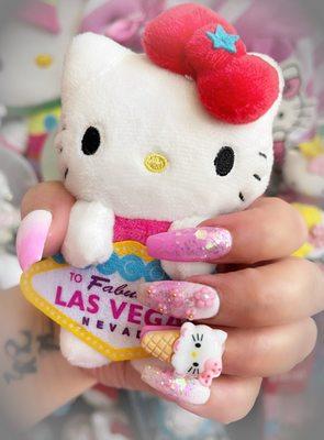 Supercute and beautiful Pink Hello Kitty nails done right by Miley!