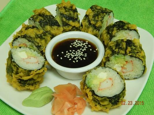 Dragon Roll.  Crab meat, cream cheese, and avocado wrapped with seaweed.  Deep fried to perfection!