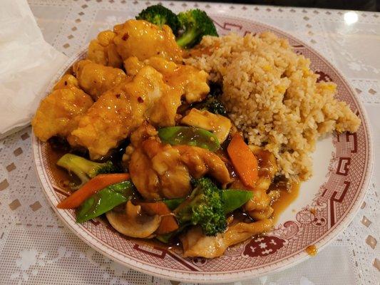 Combination dish with general tsao and chicken and vegetables