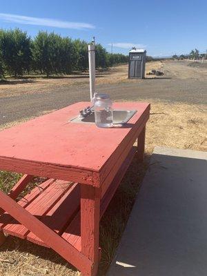 Hand washing station and portable potty