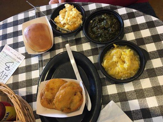 Fried green tomatoes, squash casserole, collards, mac and cheese and a roll.