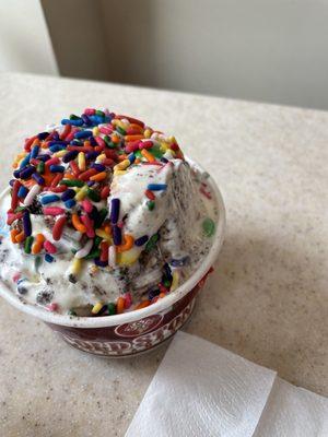 Oreo Cream with Kit Kats, M&Ms and rainbow sprinkles