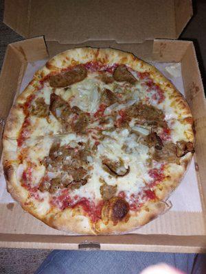 This is a New York style pizza with Italian sausage and onion...de-licious