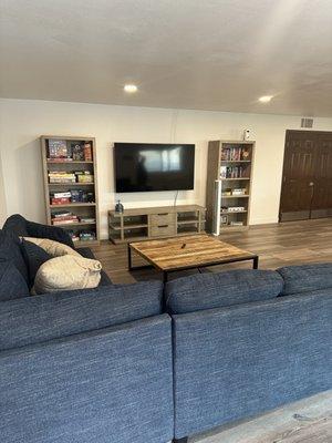 Game room with super nice and clean furniture. Not pictured are a pool table and arcade games.