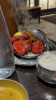 Tandoori Chicken-  Appetizer . They bring it out on a nice skillet sizzling. Must try !