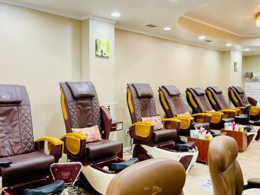 Come have a relaxing specialized pedicure in our massage chairs.