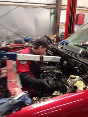 Tom getting "elbow deep" in his work at tag automotive!