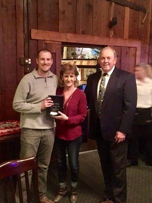 My broker, the owner of the company, and I accepting my Excellence in Sales Award for 2017. Awesome!