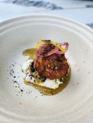 Braised Spanish meatball. Smoked cheddar grits, spiced honey, and Chile breadcrumbs. Pali Wine