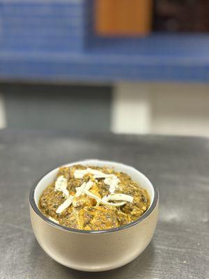 Palak paneer: Chunks of homemade cottage cheese or tofu. Cooked in a thick creamy spinach gravy seasoned with garlic, ginger