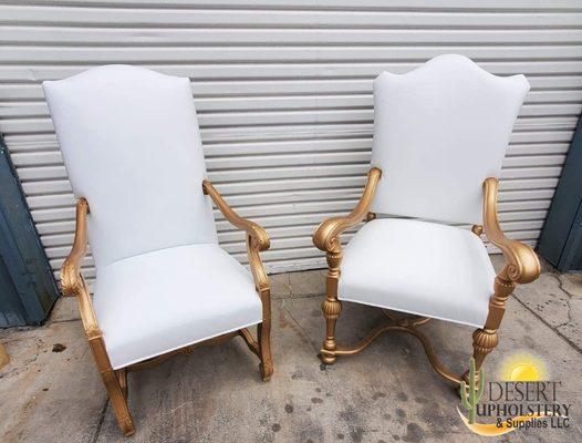 Antique chairs upholstered in genuine white leather