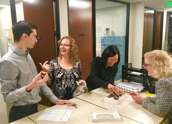 Lively discussion over the chocolate fudge at the CASA office.