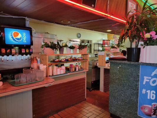 You can see the kitchen set up from the dining room.  It has changed over time.  But the magic is on your plate and made in this place!