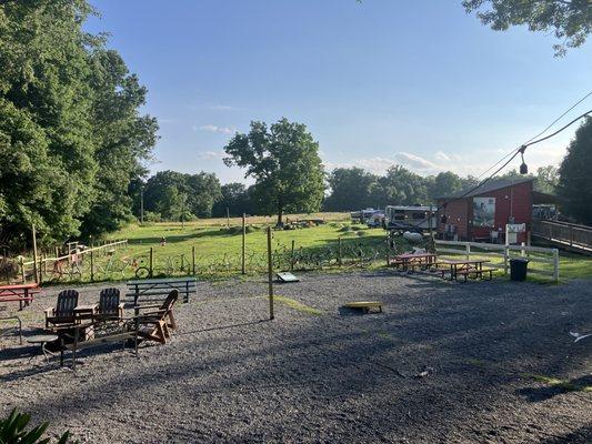 View from the patio: yard games, fire pit