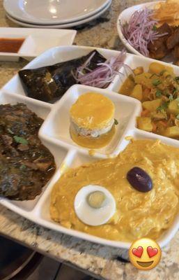 Aji de pollo, seco, cau cau, tamal, causa