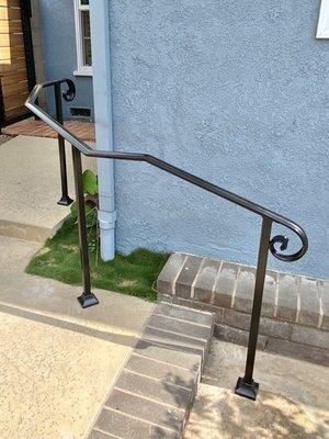 Custom contoured two-step Railing designed on site, and allowing me as a customer to assist in the designing